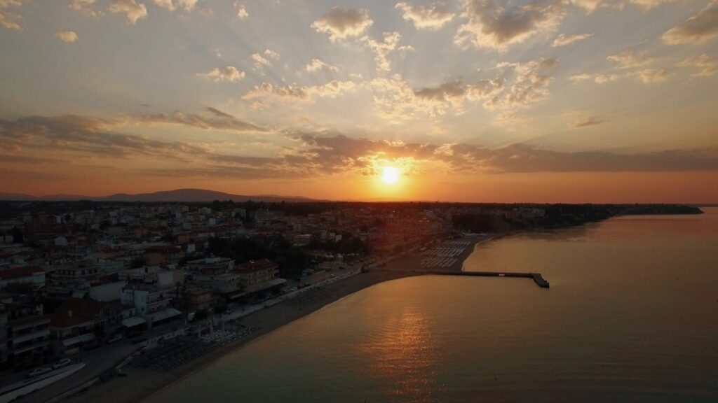 Sunrise aerial panorama of coastal resort town Nea Kallikratia, Greece